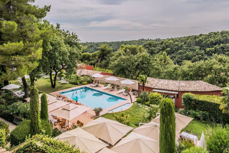 A Top View Shot of a Resort by the Mountain Side