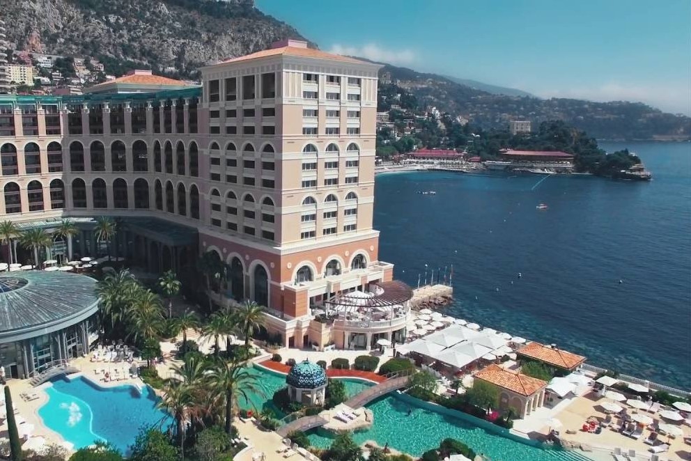 A Landscape View of a Hotel With Pools