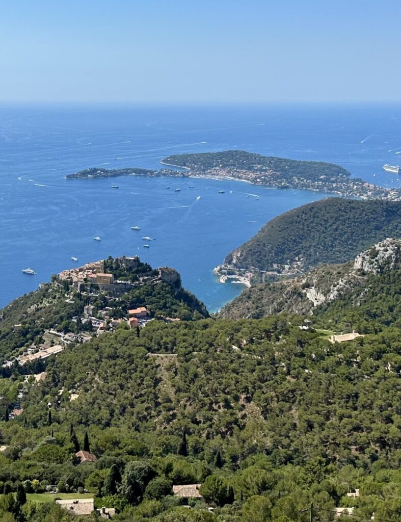 Coastal view with islands and lush greenery.