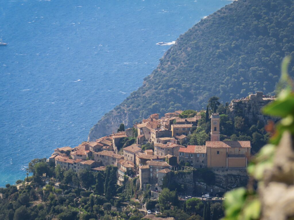 Mediterranean cliffside village overlooking blue sea
